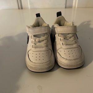 They are white with black